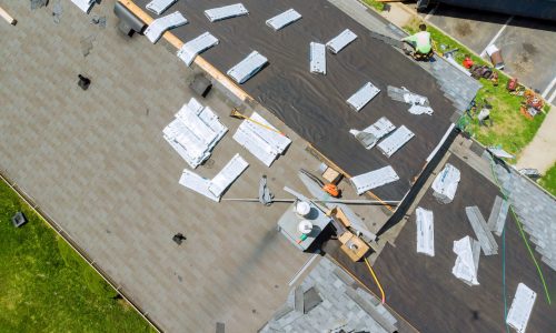 Roofer repair replace shingle that has been damaged and needing replacement